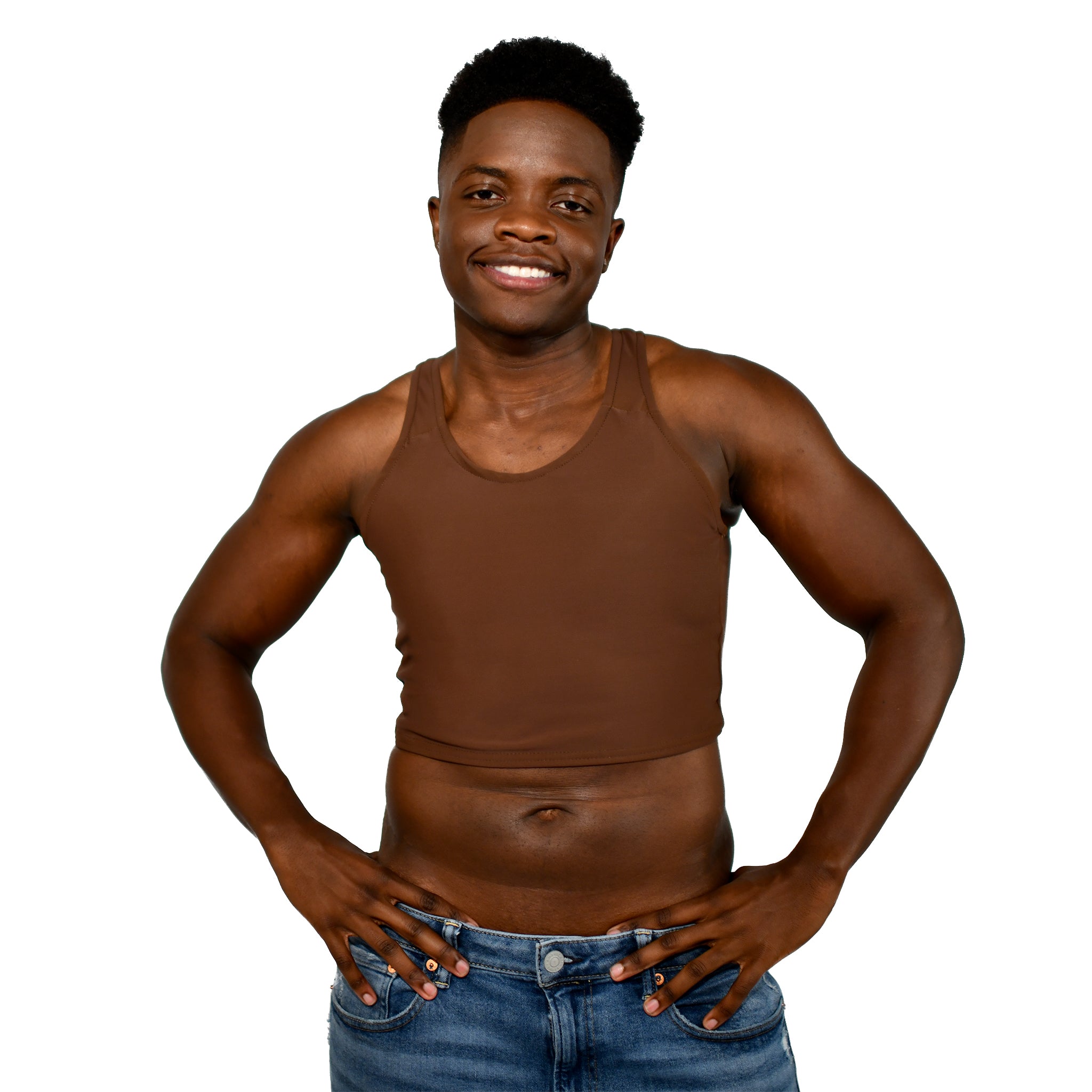 Model shows off a Nude No. 1 racerback binder, facing forward and smiling with hands on hips.