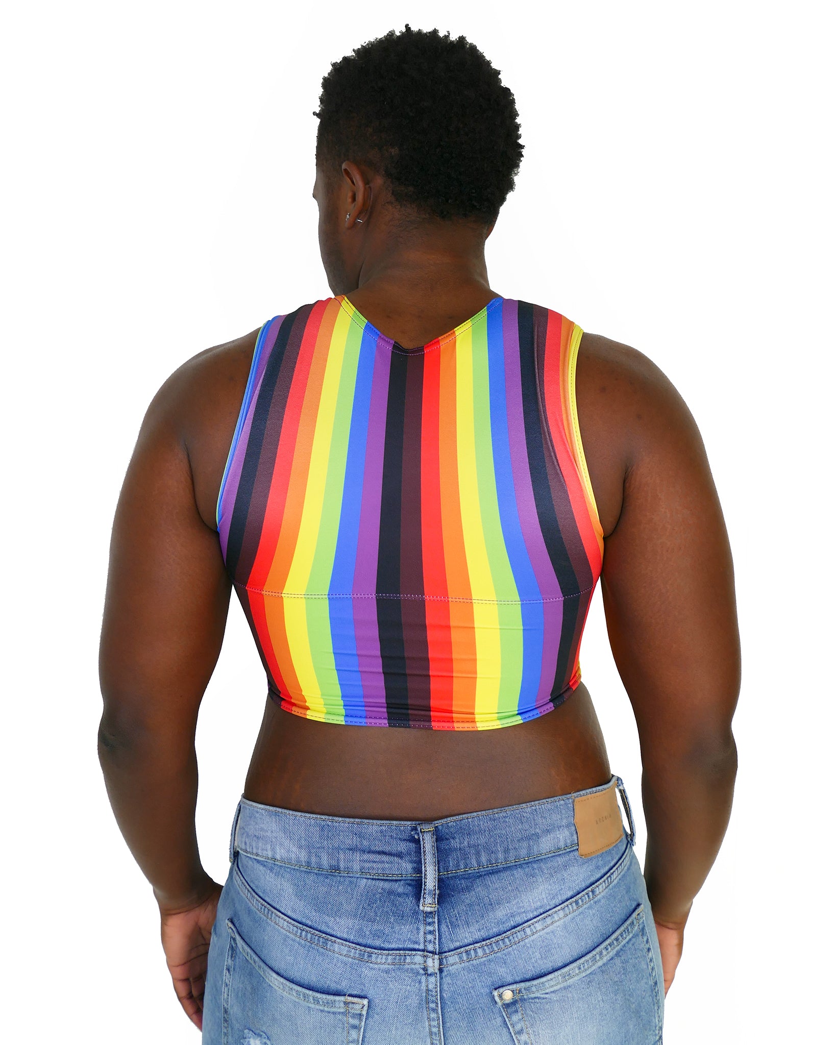 Person wearing More Color More Pride Binder, with Rainbow, Black and Brown vertical stripes.